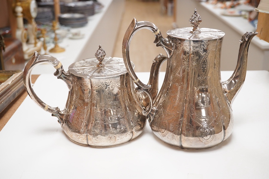 A Victorian engraved silver teapot and matching coffee pot, by George Ivory, London, 1857, gross weight 46.2oz. CITES Submission reference 4K2AZFRW. Condition - fair to good